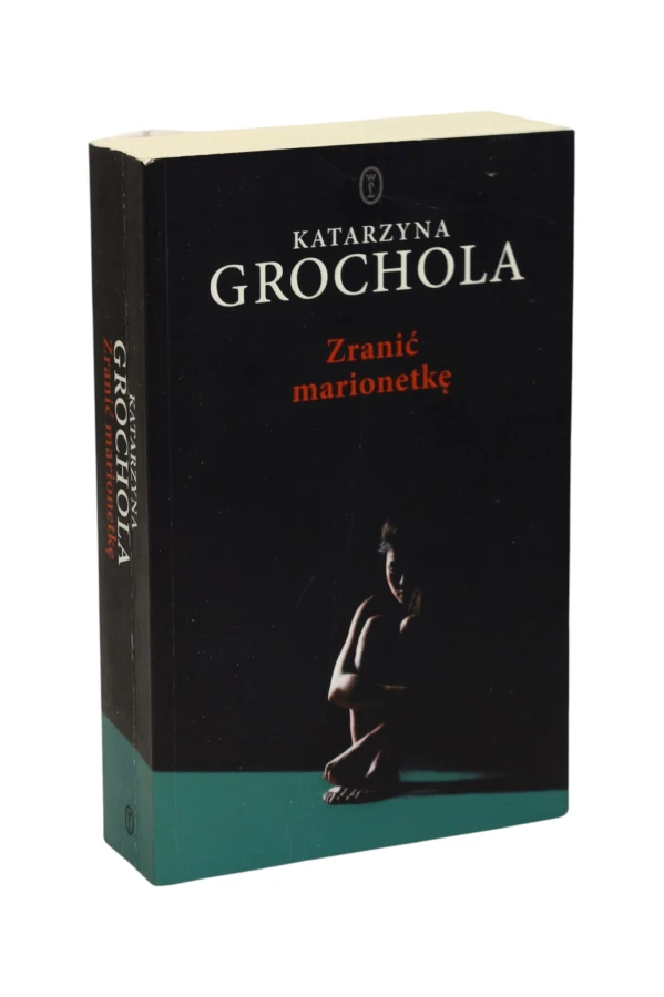 Zranić marionetkę Grochola